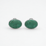 Platinum and green gemstone cufflinks from BEGÜM KHAN's MAGIC BEANS Archive collection, featuring elegant, polished design.