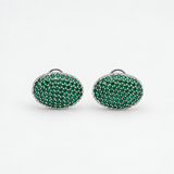 Platinum and green gemstone cufflinks from BEGÜM KHAN's MAGIC BEANS Archive collection, featuring elegant, polished design.