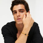 BEGÜM KHAN Maçakızı Scala bracelet featuring intricate silver design with black accents, worn on a model's wrist.